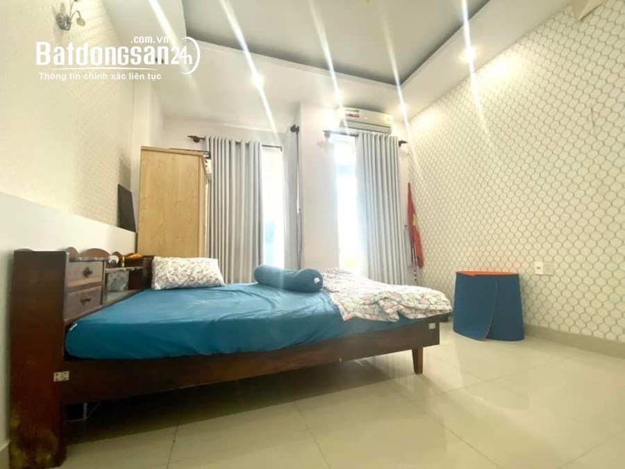 TIN THẬT:Nhà MẶT TIỀN 4x14,3 tầng hoàn công,không mộ,QH Bình Trưng Tây,Q2
