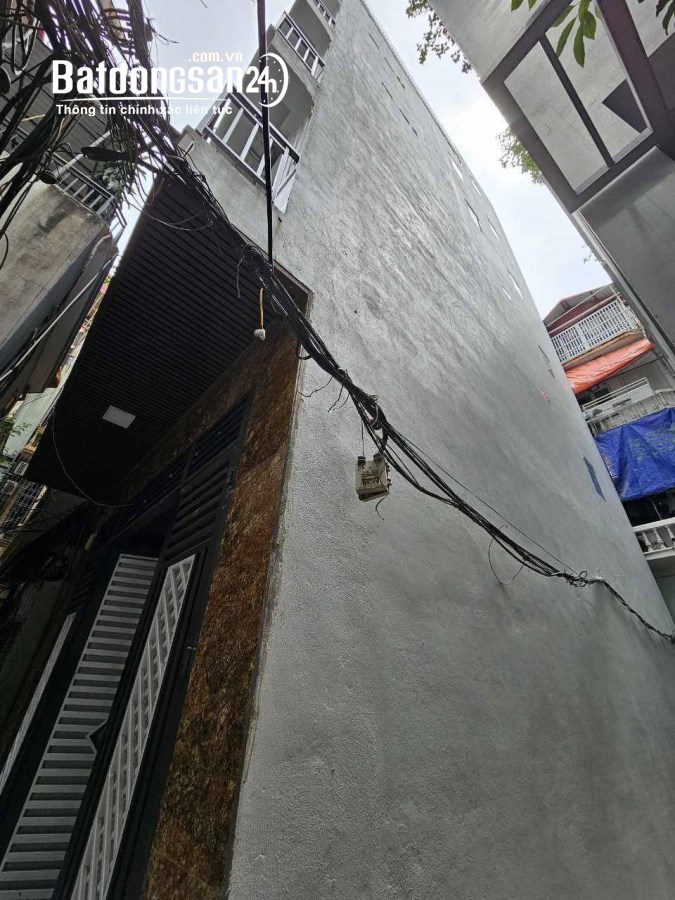 Bán tòa nhà CCMN Tam Khương Đống Đa 7T thang máy ô tô lô góc gần phố