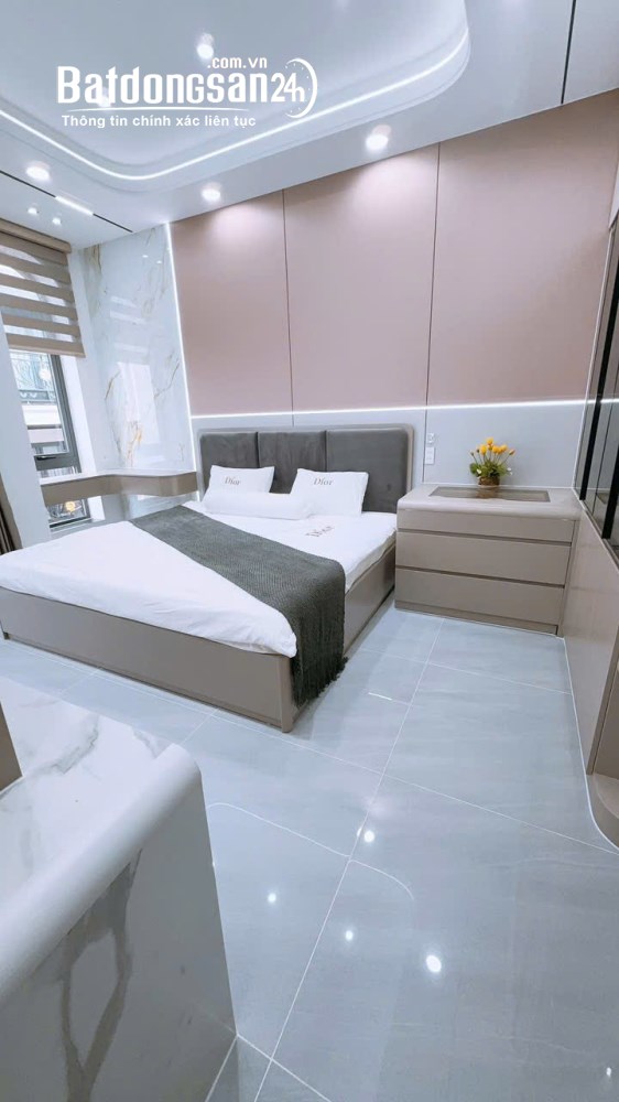 Bán nhà mới 5 lầu đường Thống Nhất, Gò Vấp, dt 5.5x9.5m, có thang máy và gara, giá 12 tỷ.
