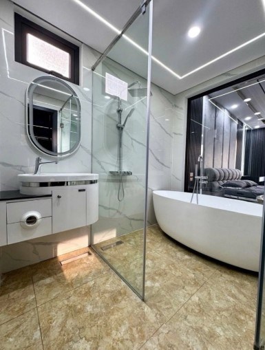 Bán tòa nhà 7 tầng TM, Ngọc Lâm - Long Biên, 58m², gara 2 ô tô, full nội thất cao cấp