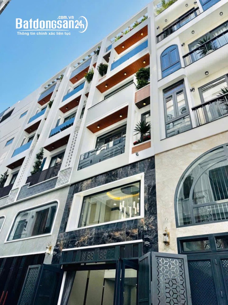 Bán nhà Gò Vấp, DT 4x10m, thang máy, gara ô tô, sổ hồng, giá 7,99 tỷ.